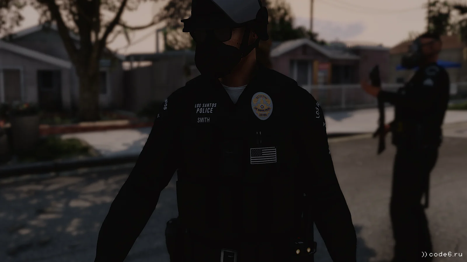 The uniform says POLICE. The building stands on HISTORY!